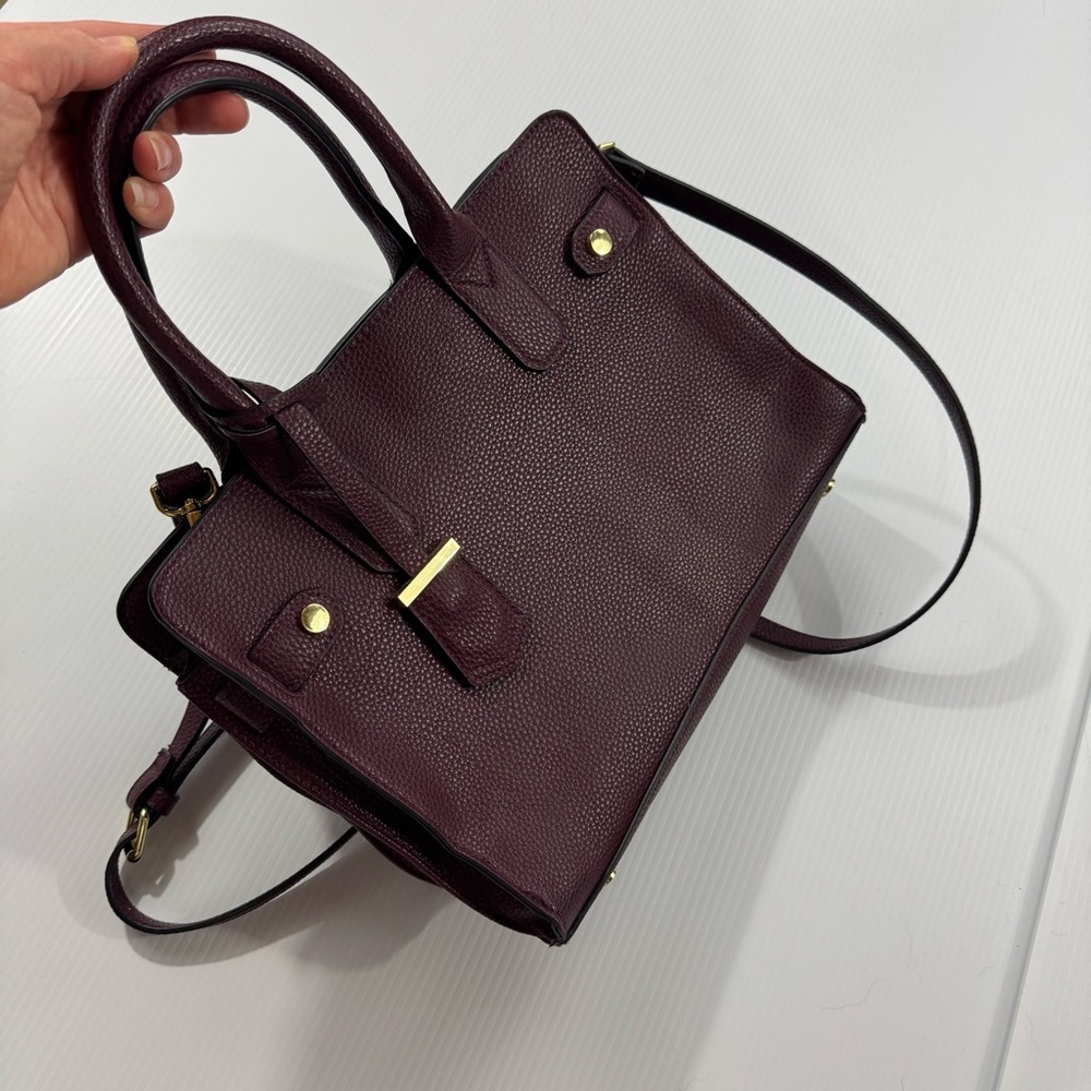 16. Women’s a new day Deep Purple hand bag